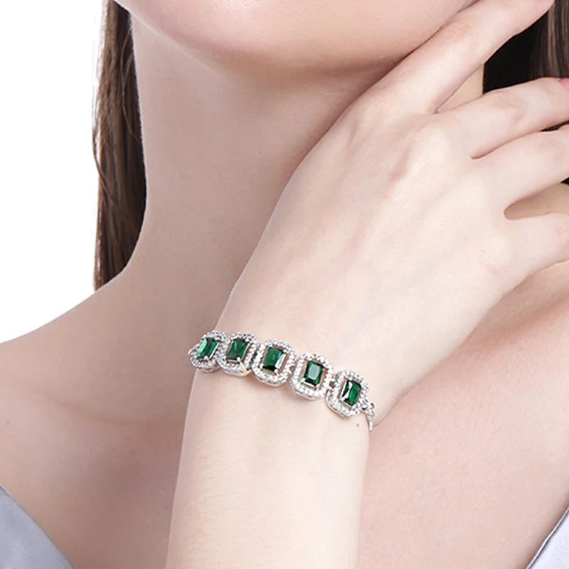 bracelet with lotus charm for spiritual balance-Estele Rhodium Plated CZ Ossum Octagon Bracelet With Emerald Crystals for Women