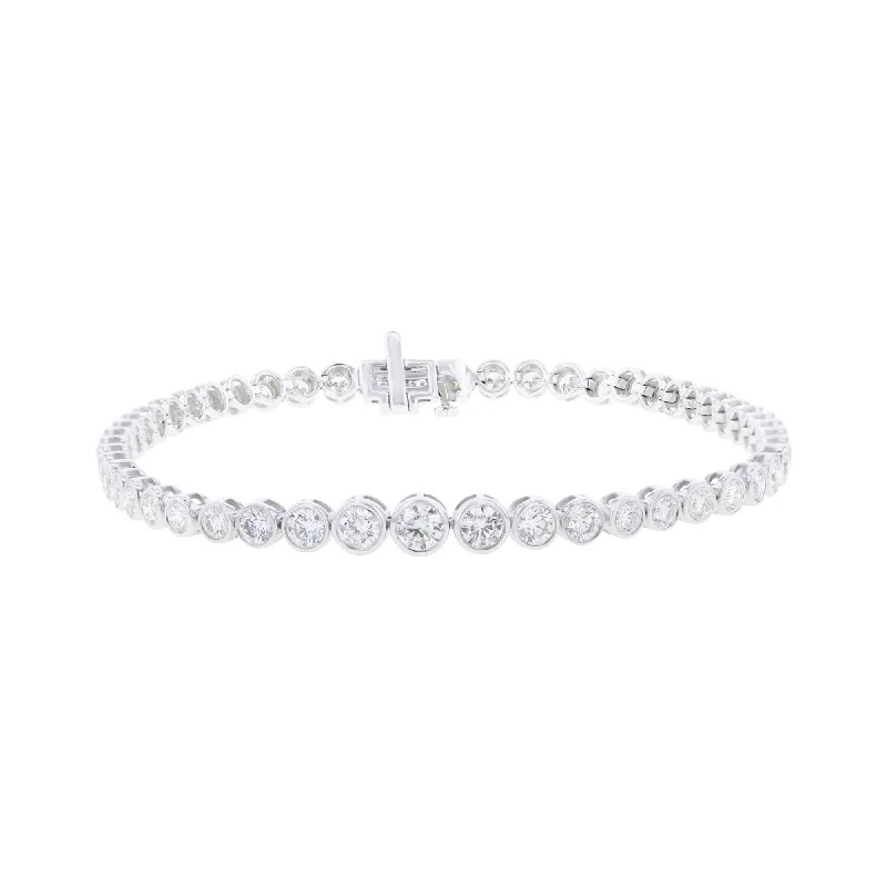 custom charm bracelet with engraved initials for friends-Gillian Graduated Bezel Diamond Tennis Bracelet