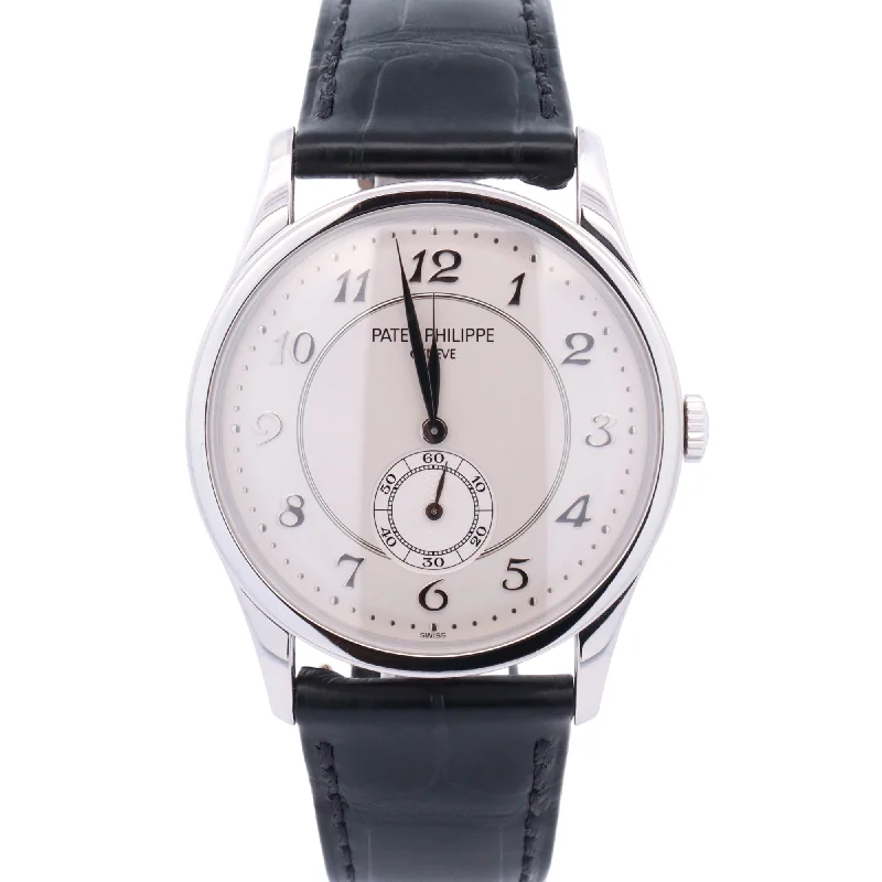 elegant watches for men with minimalistic dials and sleek bands -Patek Philippe Calatrava 37mm 950 Platinum Silver Arabic Dial Watch Reference# 5196P-001