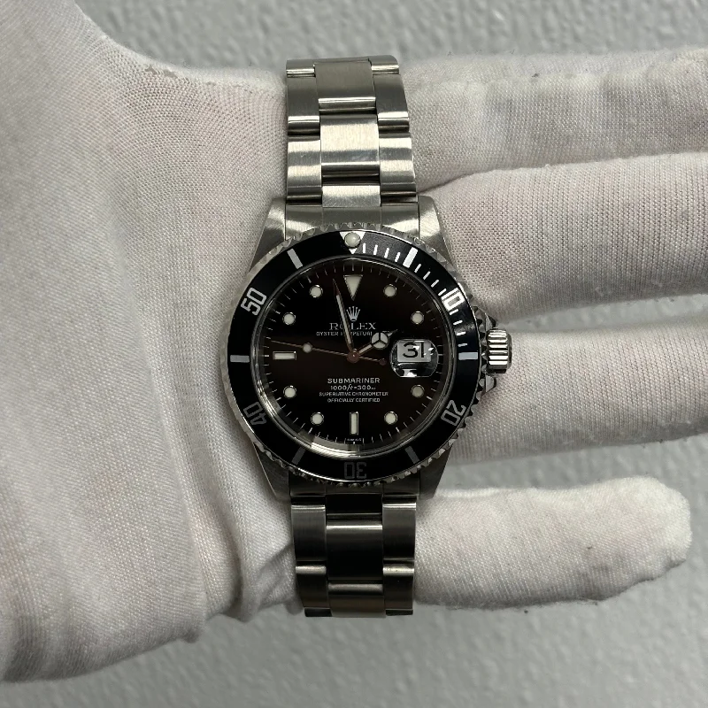 watches for women with silver cases and minimalist designs -Rolex Submariner 40mm Black Dial Ref# 16610